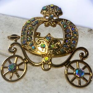 Elegant Gold Carriage Brooch with Iridescent Accents